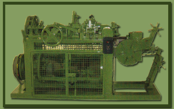 Barbed wire making machine