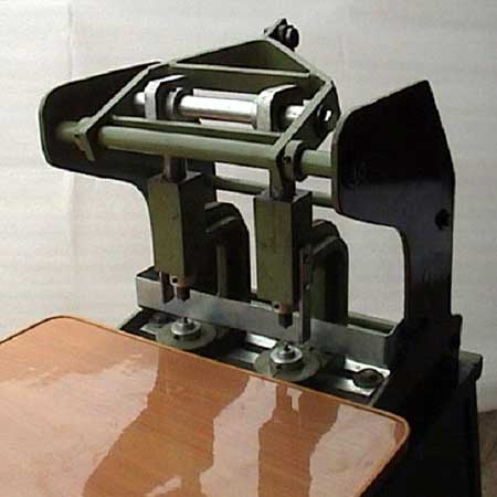 Paper bag hole punching machine