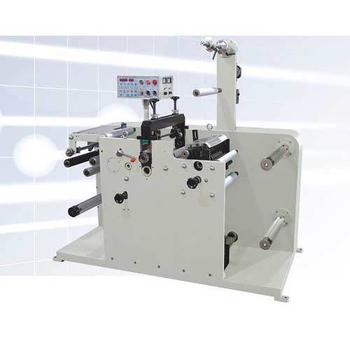 Slitting machine with rotary die cutting station